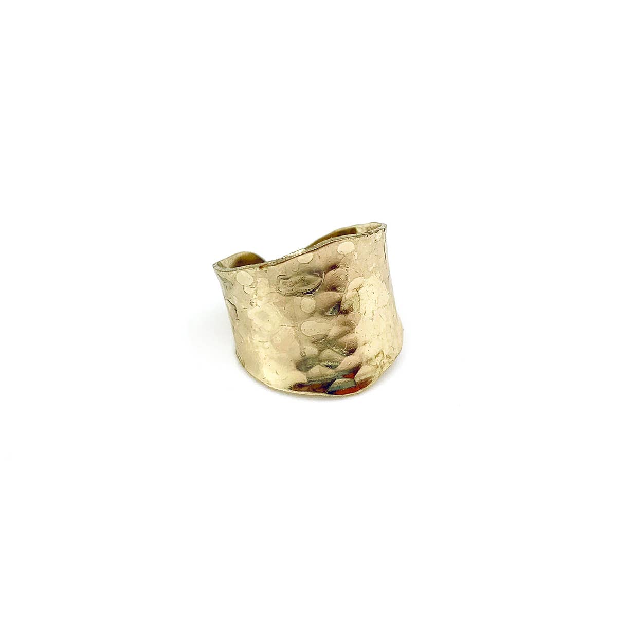 Gold textured ring on a white background
